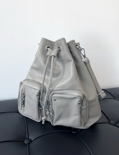 tassel pocket two-way leather bag