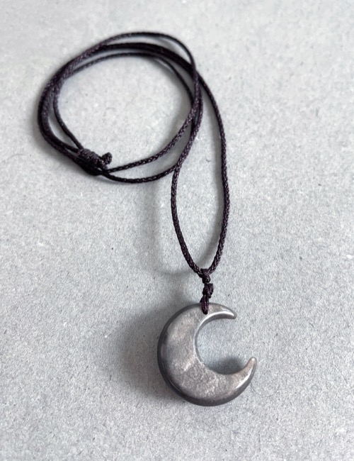 gray half moon necklace